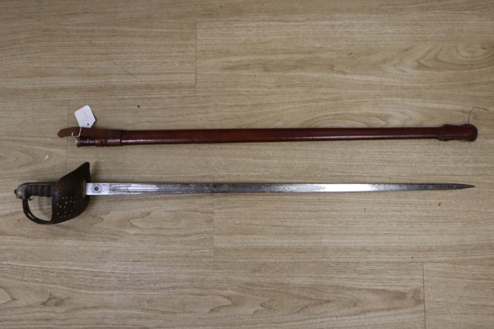 A George V officers dress sword, with leather scabbard, 100cm